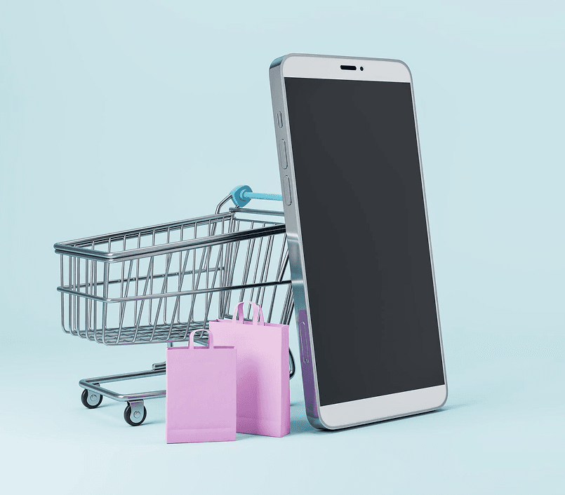 Shopping cart with smartphone and shopping bags